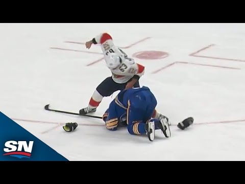 Thumbnail for Brad Marchand Leaps On Rasmus Dahlin And Comes Away With His Helmet